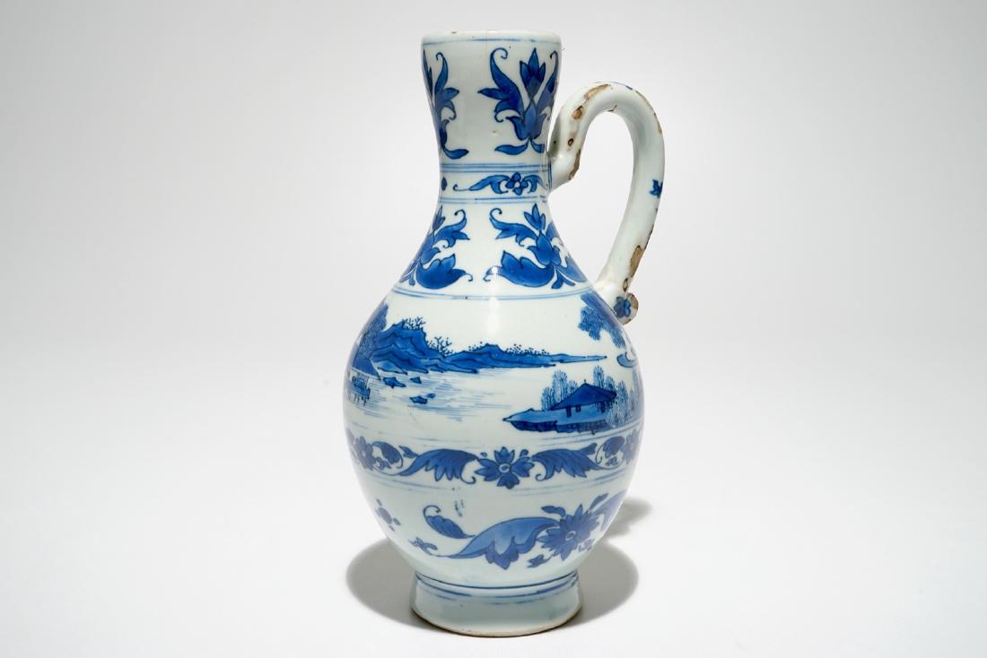 A Chinese blue and white jug with landscape design, (1 of 7)