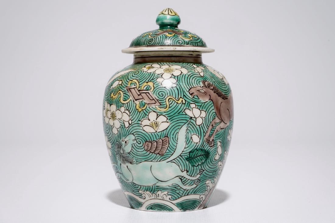 A Chinese verte biscuit covered jar with horses, Kangxi (1 of 7)
