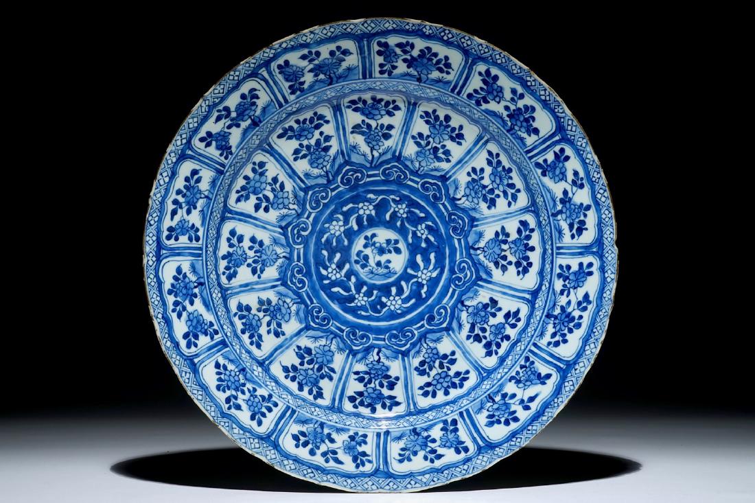 A Chinese blue and white charger with floral design,: A Chinese blue and white charger with floral design, Kangxi Dia.: 36 cm