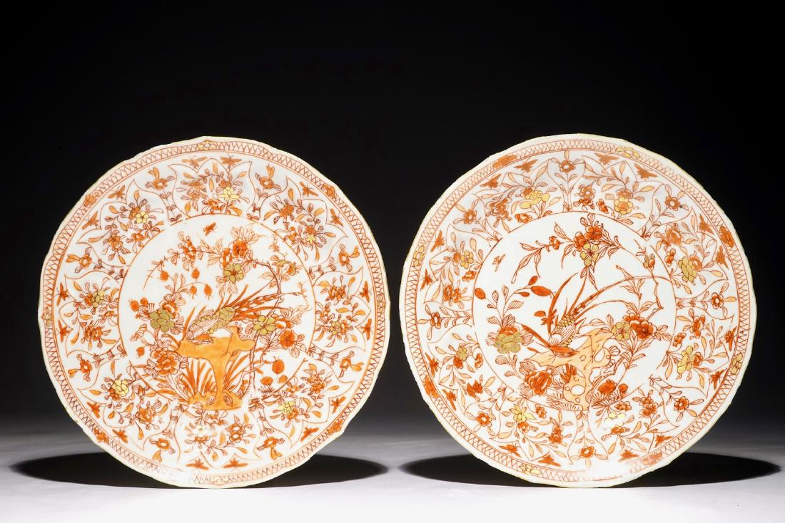 A pair of moulded Chinese iron red and gilt plates with: A pair of moulded Chinese iron red and gilt plates with pheasants, Kangxi Dia.: 22 cm