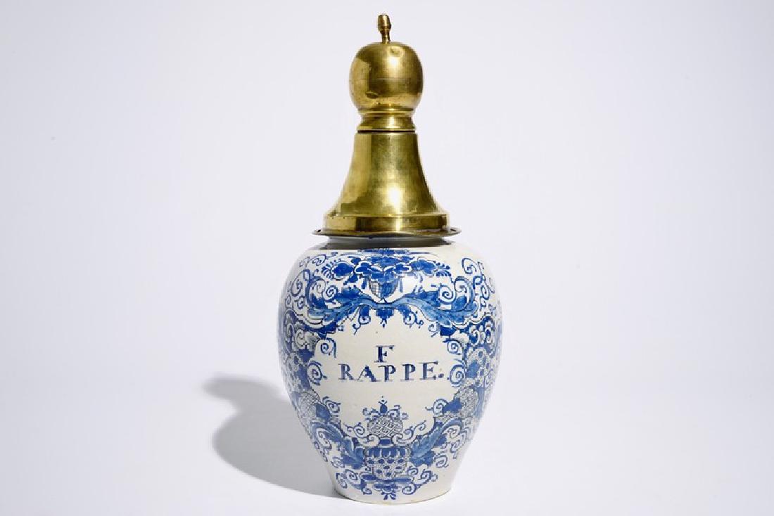 A Dutch Delft blue and white tobacco jar with brass (1 of 6)