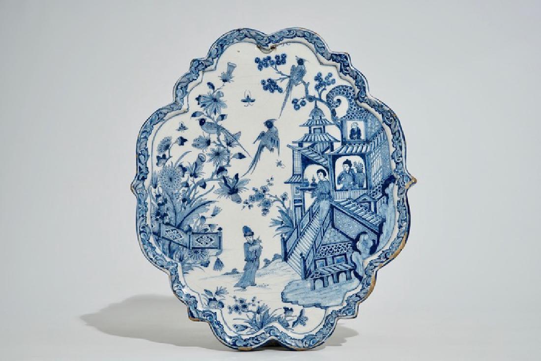 A Dutch Delft blue and white chinoiserie pagoda plaque, (1 of 2)