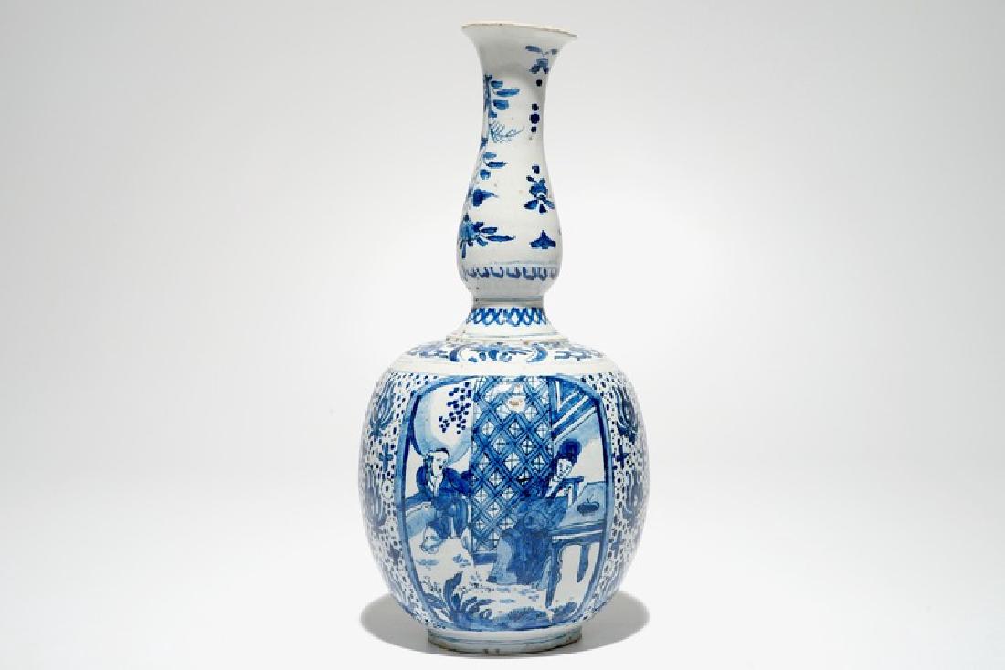 A Dutch Delft blue and white chinoiserie double gourd: A Dutch Delft blue and white chinoiserie double gourd vase, marked, ca. 1700 H.: 27,5 cm