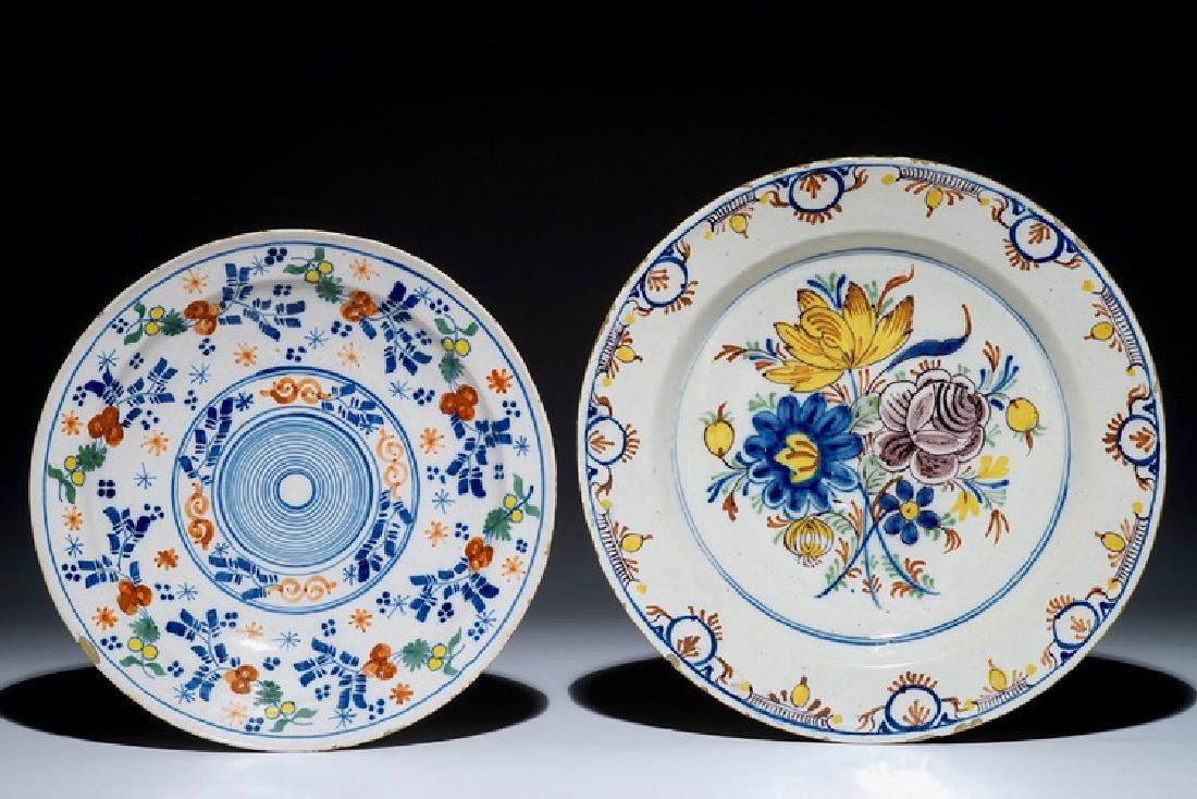 Two Dutch Delft polychrome chargers, 18th C. (1 of 2)