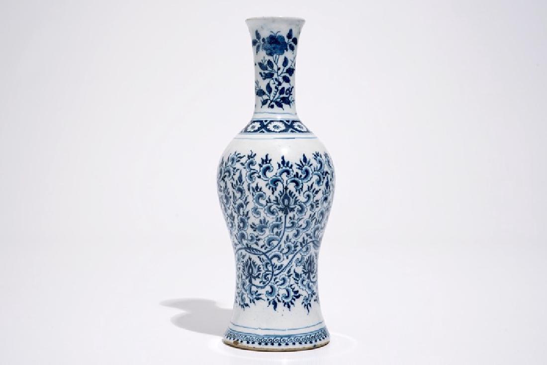 A Dutch Delft blue and white vase with peony scrolls in (1 of 6)