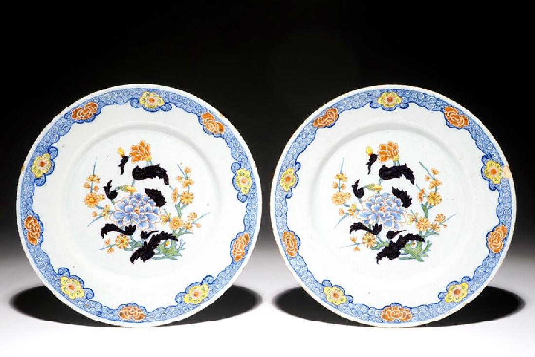 A pair of Dutch Delft black-enhanced chinoiserie plates (1 of 2)