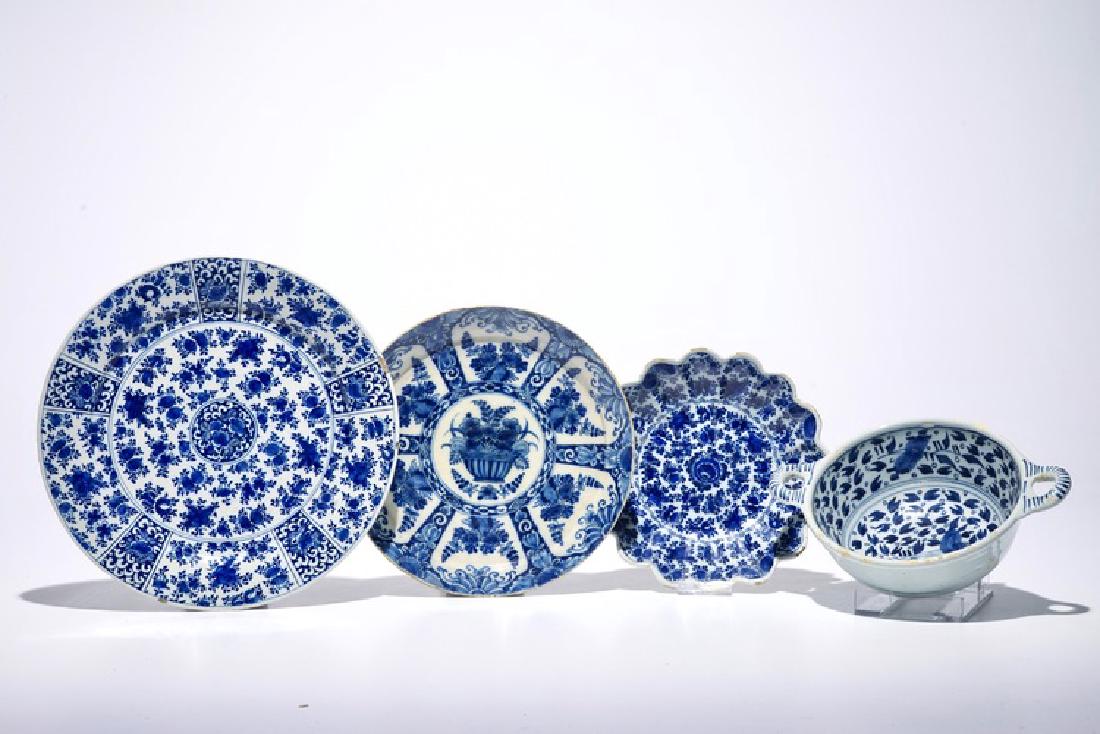 Three Dutch Delft blue and white plates and a two-eared (1 of 3)