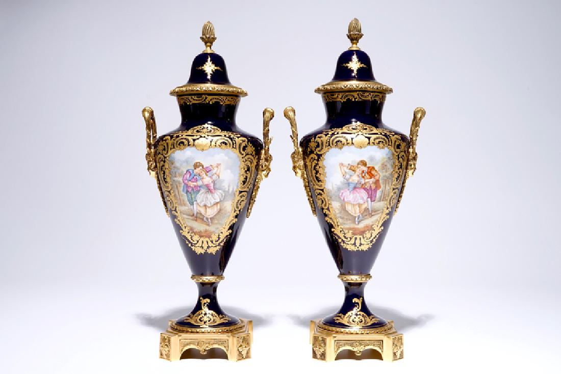 A pair of French ormolu-mounted covered vases in (1 of 7)