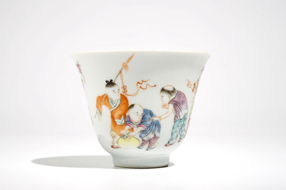 A Chinese famille rose wine cup with playing boys,: A Chinese famille rose wine cup with playing boys, Republic, 20th C. H.: 7 cm - Dia.: 9 cm