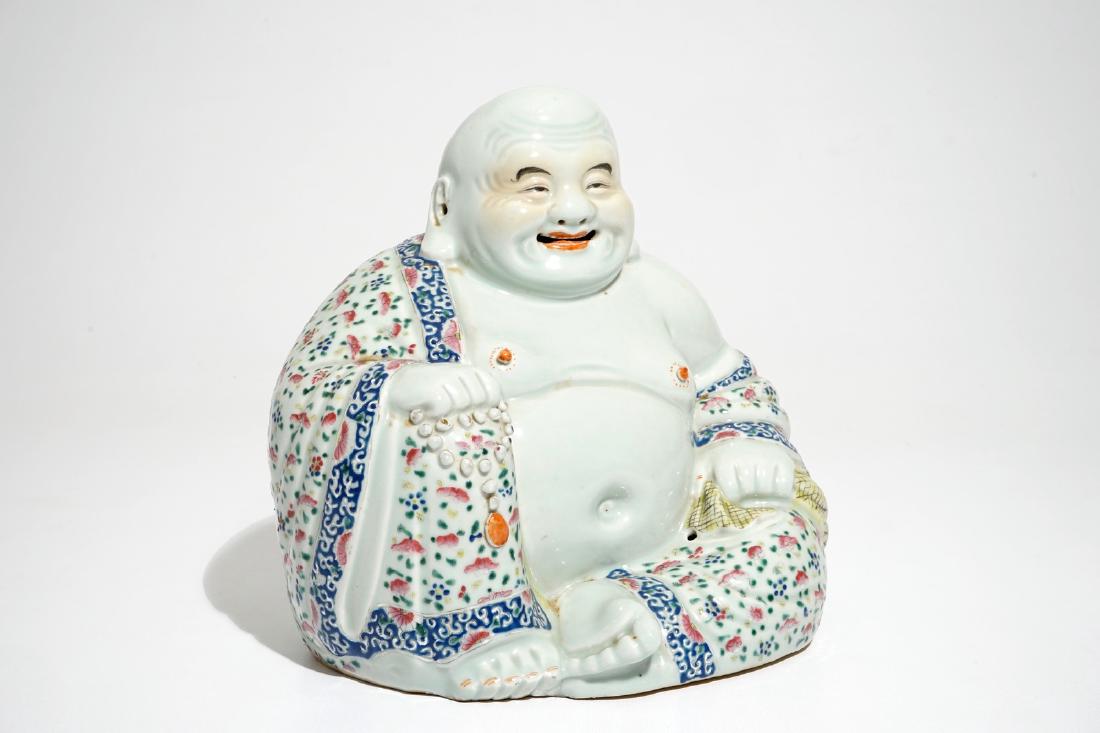 A Chinese famille rose model of Buddha, 19/20th C.: A Chinese famille rose model of Buddha, 19/20th C. H.: 26 cm - L.: 26 cm - W.: 20 cm