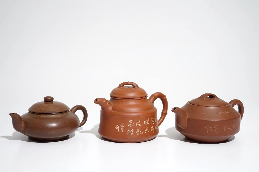 Three various Chinese Yixing stoneware teapots and (1 of 7)