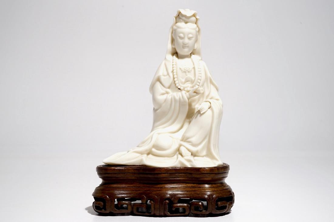 A Chinese Dehua blanc de Chine Guanyin on wooden stand, (1 of 7)