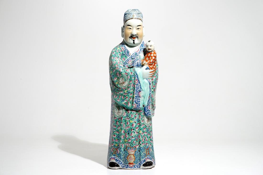 A tall Chinese famille rose figure of an immortal, 19th: A tall Chinese famille rose figure of an immortal, 19th C. H.: 63 cm