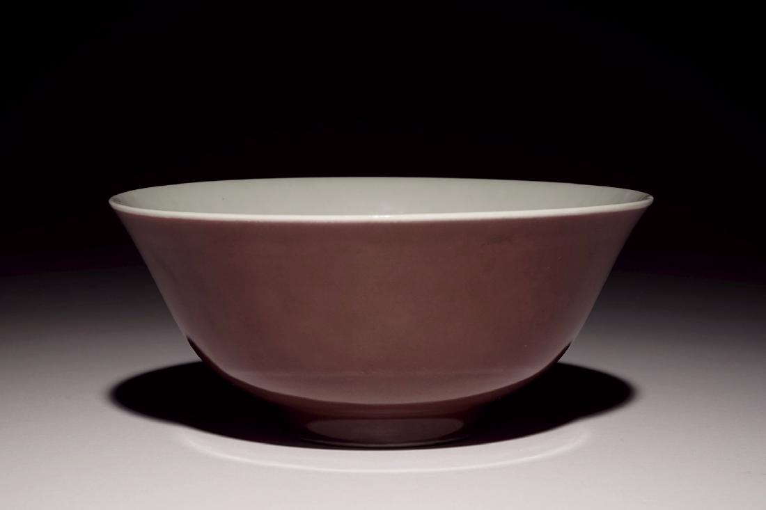 A Chinese dark aubergine monochrome bowl, Daoguang: A Chinese dark aubergine monochrome bowl, Daoguang mark, 19/20th C. H.: 6,5 cm - Dia.: 15 cm