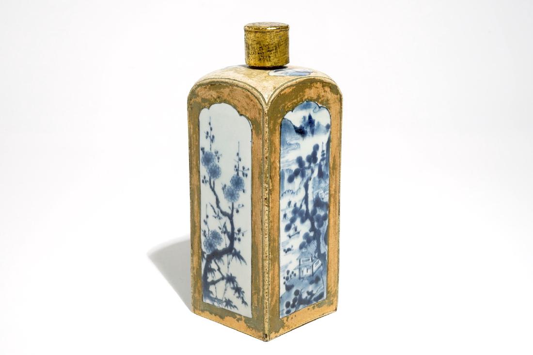 A square Japanese Arita blue and white bottle with: A square Japanese Arita blue and white bottle with biscuit frame, Edo, 17/18th C. H.: 23,5 cm