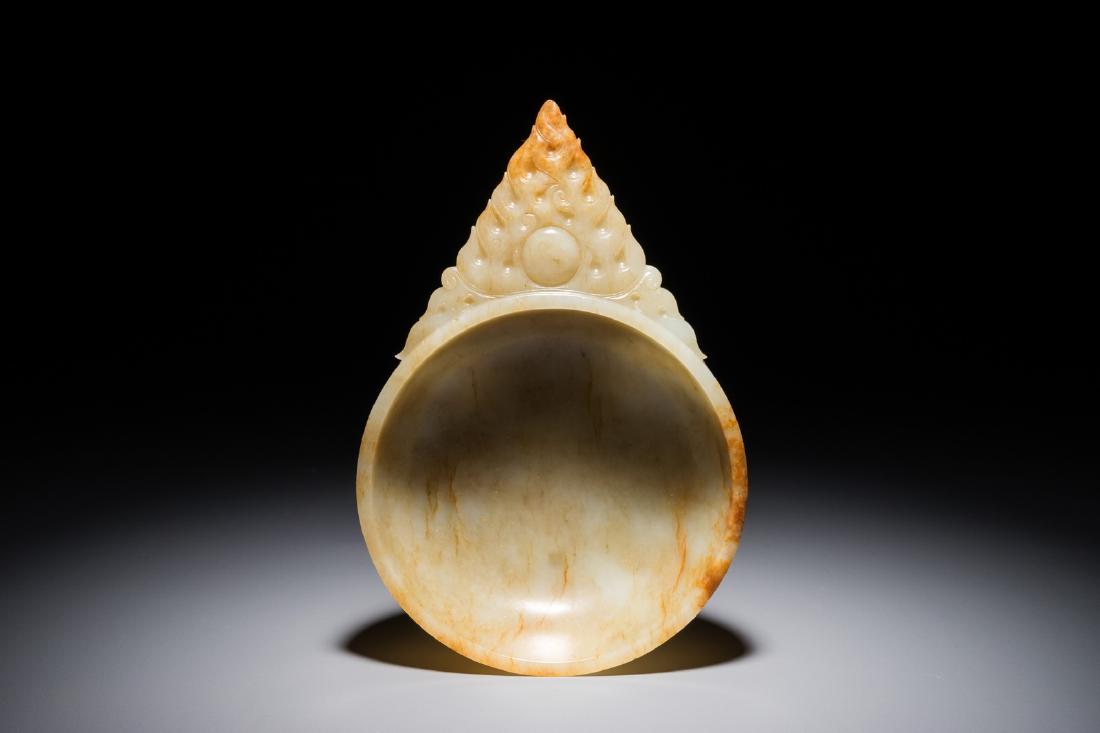 A Chinese russet jade bowl with triangular handle, (1 of 9)