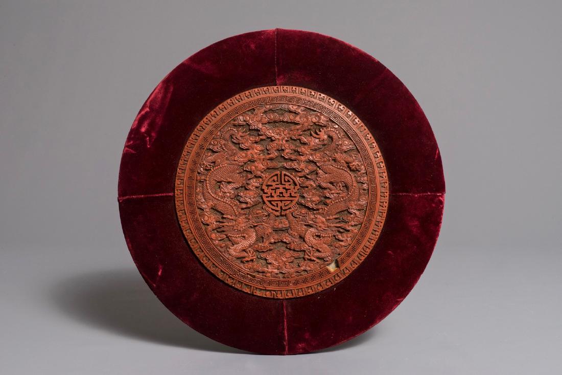 A round Chinese cinnabar lacquer plaque with two (1 of 3)
