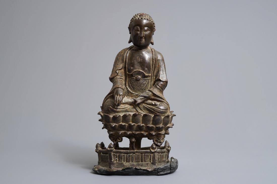 A Chinese bronze figure of Buddha Shakyamuni on lotus (1 of 7)