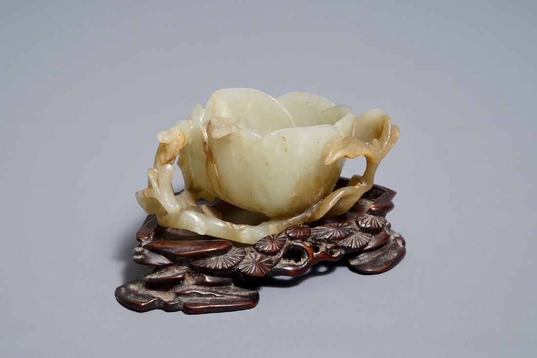 A Chinese lotus-shaped jade libation cup on stand, (1 of 7)