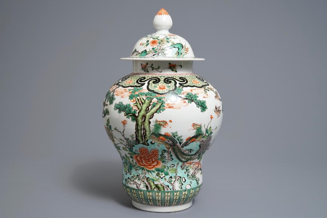 A Chinese famille verte vase and cover with birds and: A Chinese famille verte vase and cover with birds and phoenixes, 19th C. H.: 44,5 cm