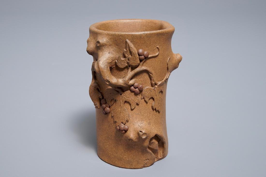A Chinese Yixing stoneware brush pot with applied (1 of 7)