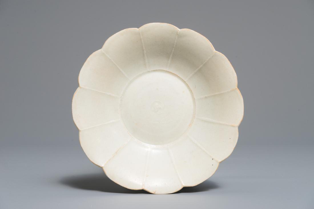 A Chinese Qingbai chrysanthemum dish, Song or later (1 of 2)