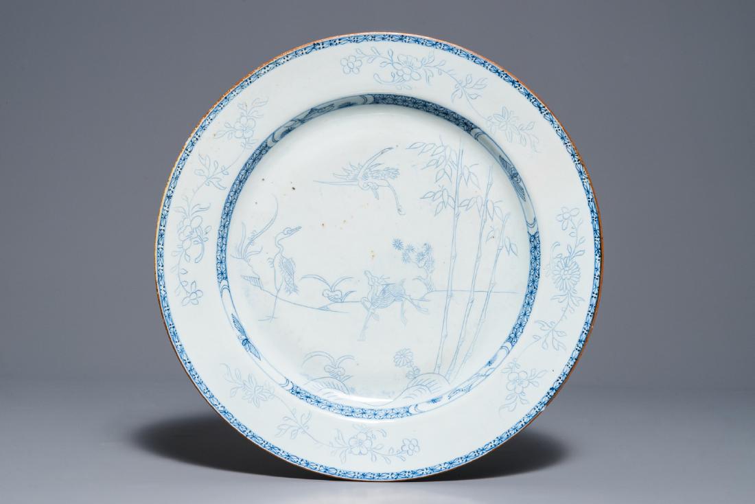A Chinese blue and white pencil-style charger with a: A Chinese blue and white pencil-style charger with a deer and two herons, Yongzheng Dia.: 38 cm