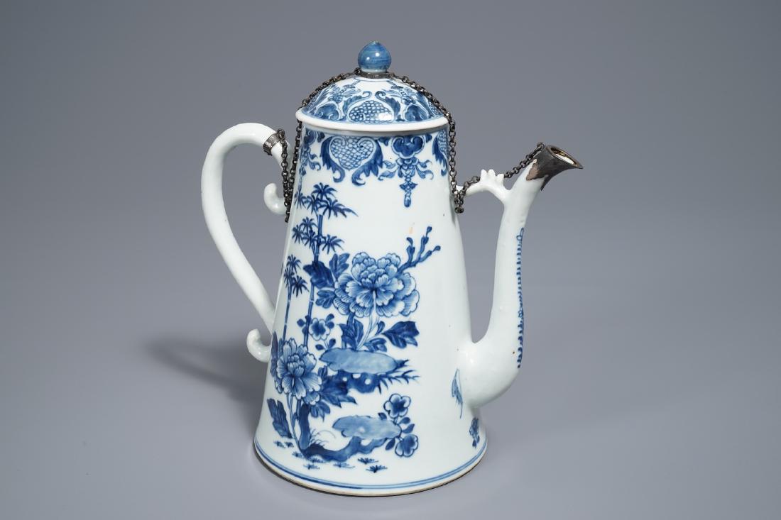 A Chinese blue and white silver-mounted jug and cover,: A Chinese blue and white silver-mounted jug and cover, Qianlong H.: 27 cm