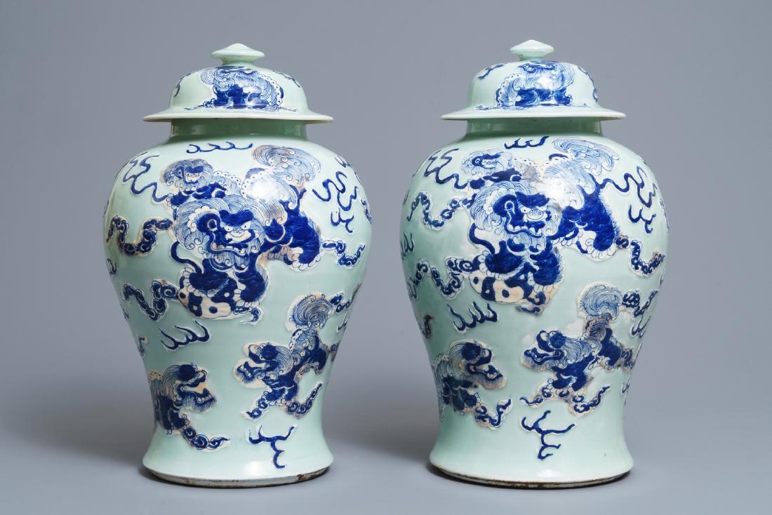 A pair of Chinese blue, white and underglaze red: A pair of Chinese blue, white and underglaze red celadon ground vases and covers, 19/20th C. H.: 45,5 cm ------ Please request condition reports by e-mail on info@rm-auctions.com or by using the LiveA
