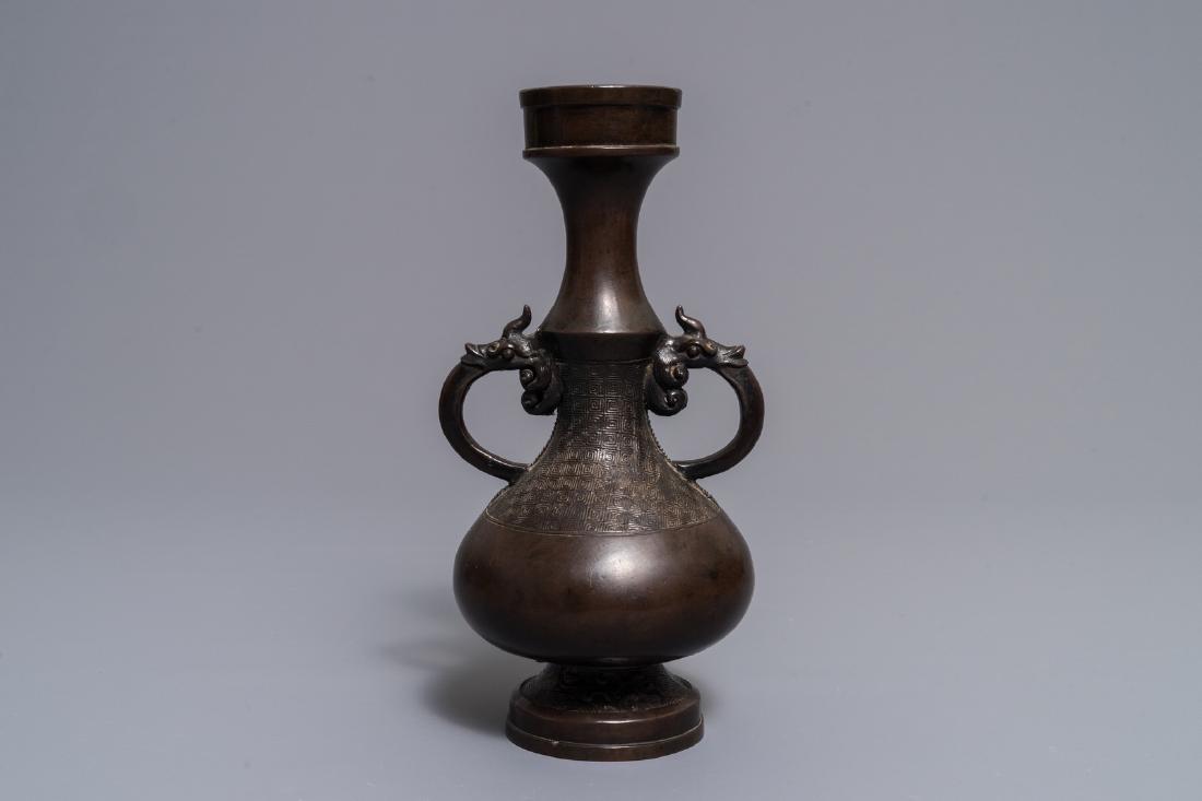 A Chinese bronze relief-decorated vase, Yuan/Ming (1 of 6)