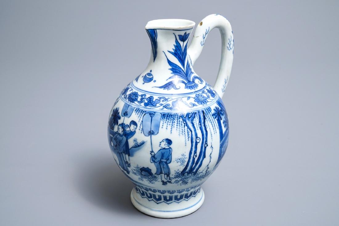 A Chinese blue and white jug with figures in a (1 of 7)