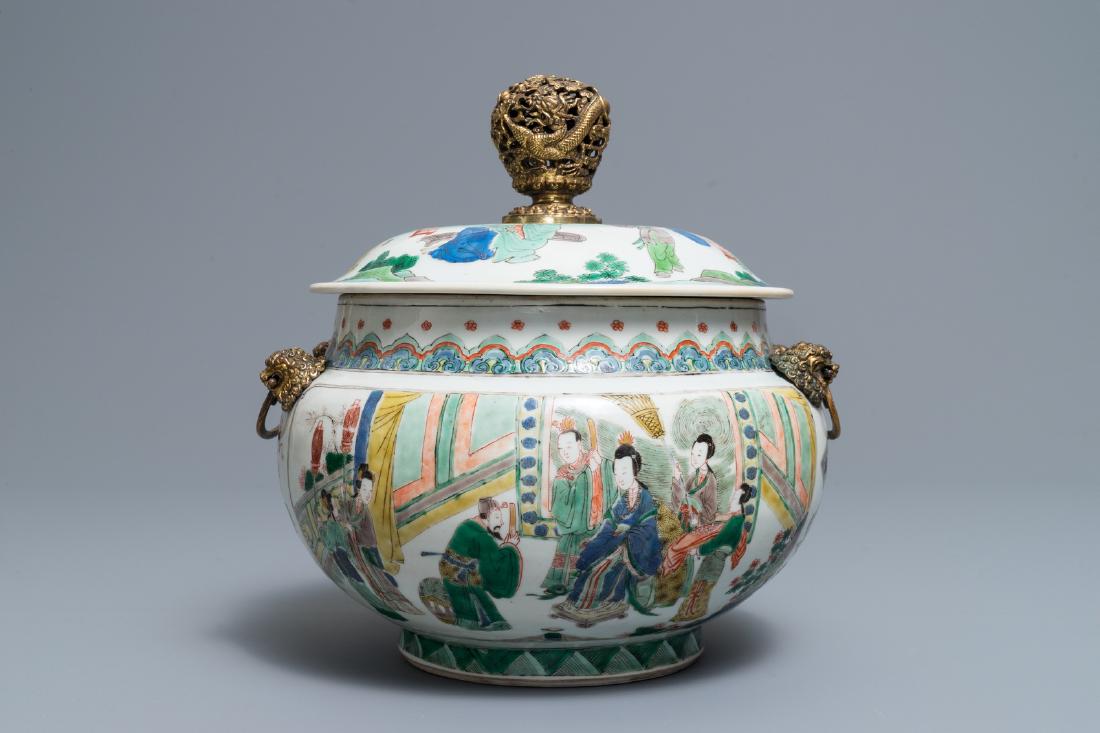 A Chinese gilt bronze-mounted famille verte bowl and: A Chinese gilt bronze-mounted famille verte bowl and cover, Kangxi H.: 25 cm Dia.: 24,5 cm --------- Please request condition reports by e-mail on info@rm-auctions.com or by using the LiveAuctioneers 