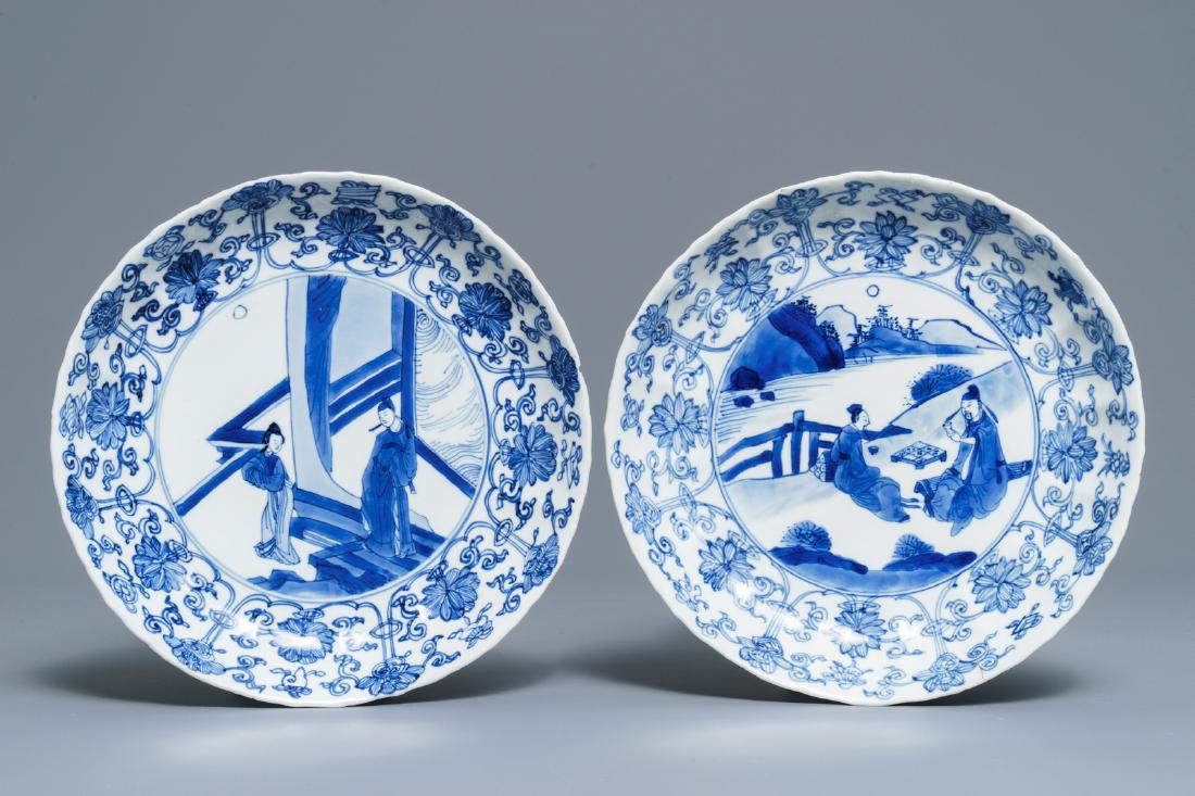 Two Chinese blue and white moulded plates with figures, (1 of 2)