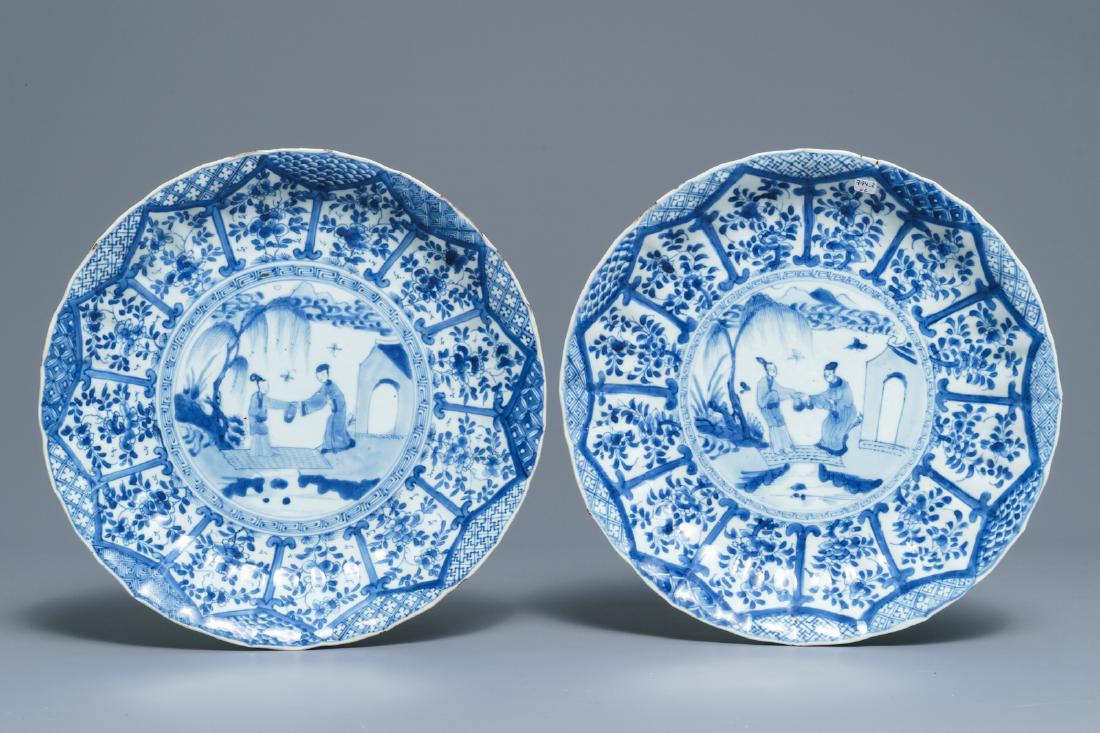 A pair of Chinese blue and white 'Romance of the: A pair of Chinese blue and white 'Romance of the Western chamber' fluted dishes, Kangxi Dia.: 27 cm --------- Please request condition reports by e-mail on info@rm-auctions.com or by using the LiveAuc