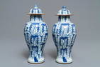 A pair of Chinese blue and white vases and covers with