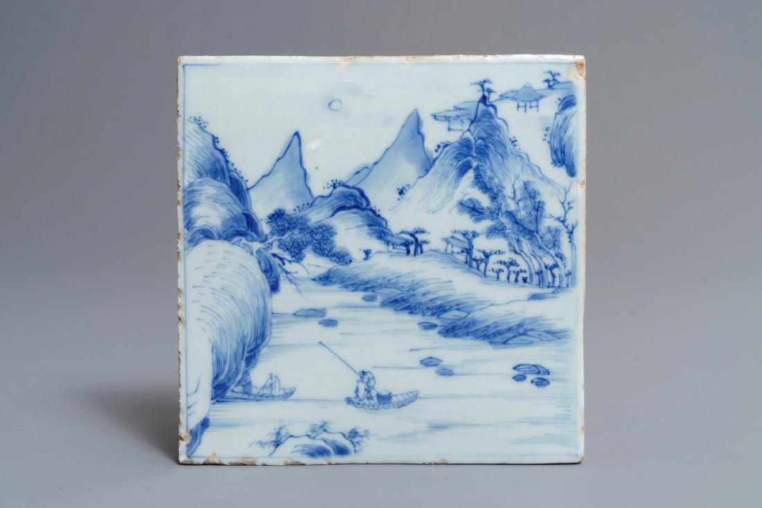 A Chinese blue and white mountainous landscape tile, (1 of 2)
