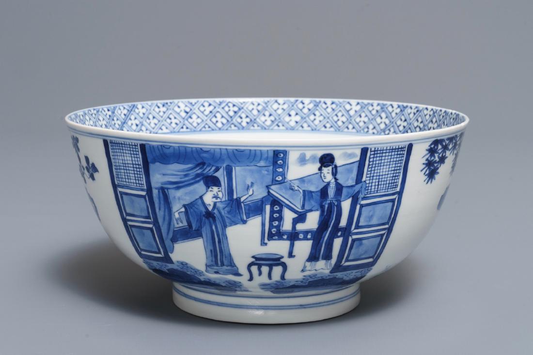 A Chinese blue and white bowl with floral and narrative: A Chinese blue and white bowl with floral and narrative panels, Kangxi mark and of the period Dia.: 20 cm - H.: 9,5 cm --------- Please request condition reports by e-mail on info@rm-auctions.com or b