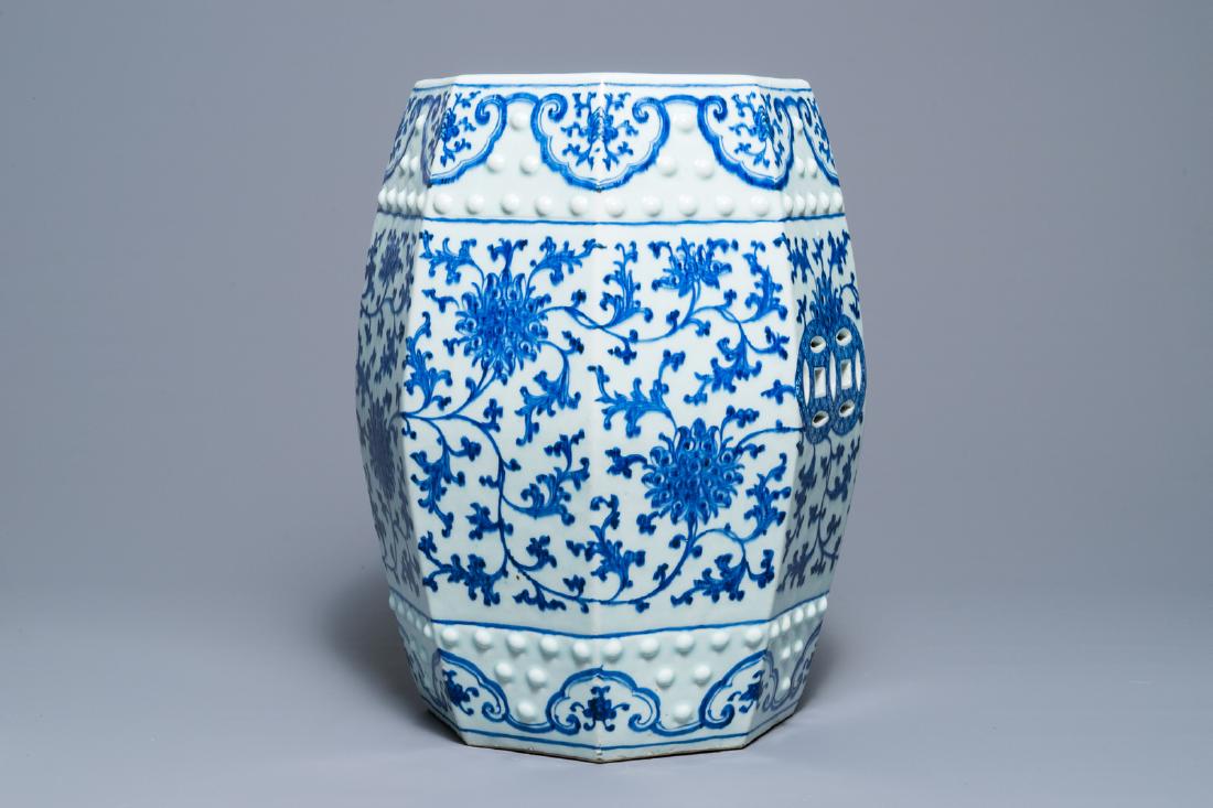 An octagonal Chinese blue and white 'lotus scroll': An octagonal Chinese blue and white 'lotus scroll' garden seat, Qianlong H.: 48,5 cm --------- Please request condition reports by e-mail on info@rm-auctions.com or by using the LiveAuctioneers messag