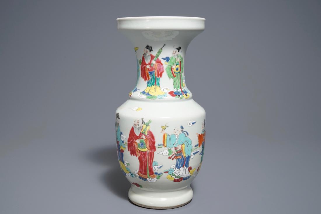 A Chinese famille rose 'Immortals' vase, 19th C.: A Chinese famille rose 'Immortals' vase, 19th C. ----- H.: 37,5 cm Condition: (UV-checked)- With a C-shaped hairline running down from the top rim, visible on the inside but overspraid on the outside.