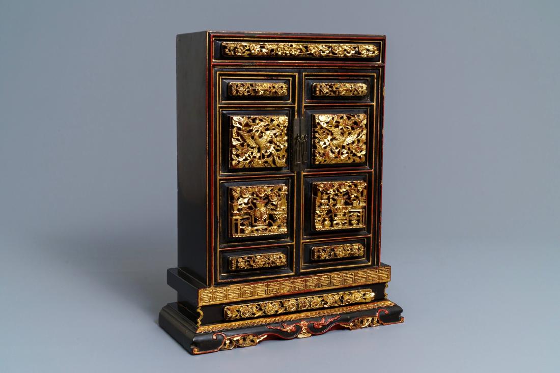 A Chinese Peranakan or Straits market gilded and: A Chinese Peranakan or Straits market gilded and lacquered altar cabinet, 19th C. ----- Dim.: 43,5 x 35 x 15 cm The interior finely decorated with gilt landscapes on a black lacquered ground.