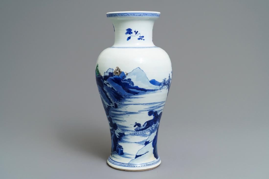 A Chinese blue and white 'river landscape' baluster: A Chinese blue and white 'river landscape' baluster vase with overglaze accents, Kangxi ----- H.: 41 cm Provenance: The Morpurgo collection, Amsterdam, The Netherlands. Acquired in 1957.