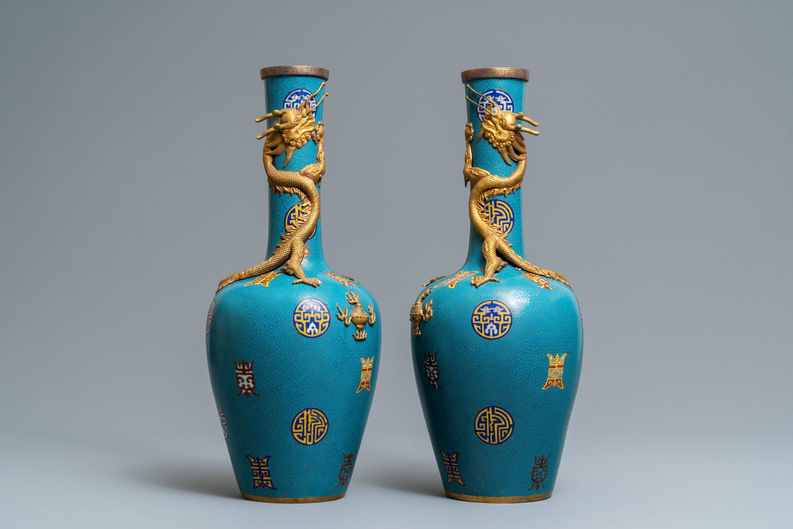 A pair of Chinese cloisonne, 19th C.: A pair of Chinese cloisonne 'dragon' vases, 19th C. H.: 51,5 cm