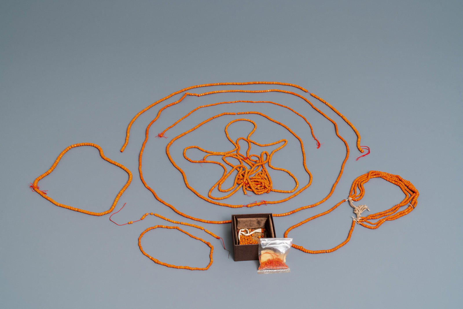 A collection of Chinese necklaces with red coral beads: A collection of Chinese necklaces with red coral beads and loose beads, 19/20th C. Weight: ca. 540 grams