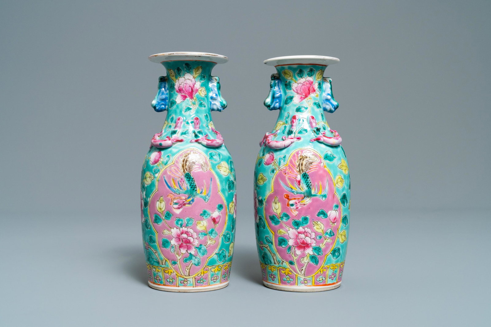 A pair of Chinese turquoise-ground famille rose vases: A pair of Chinese turquoise-ground famille rose vases for the Straits or Peranakan market, 19th C. H.: 20 cm