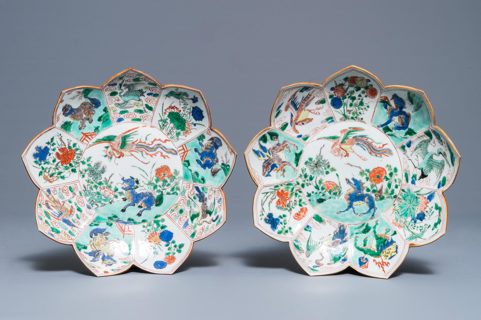A pair of Chinese famille verte lotus-shaped plates,: A pair of Chinese famille verte lotus-shaped plates, Kangxi Dia.: 23 cm