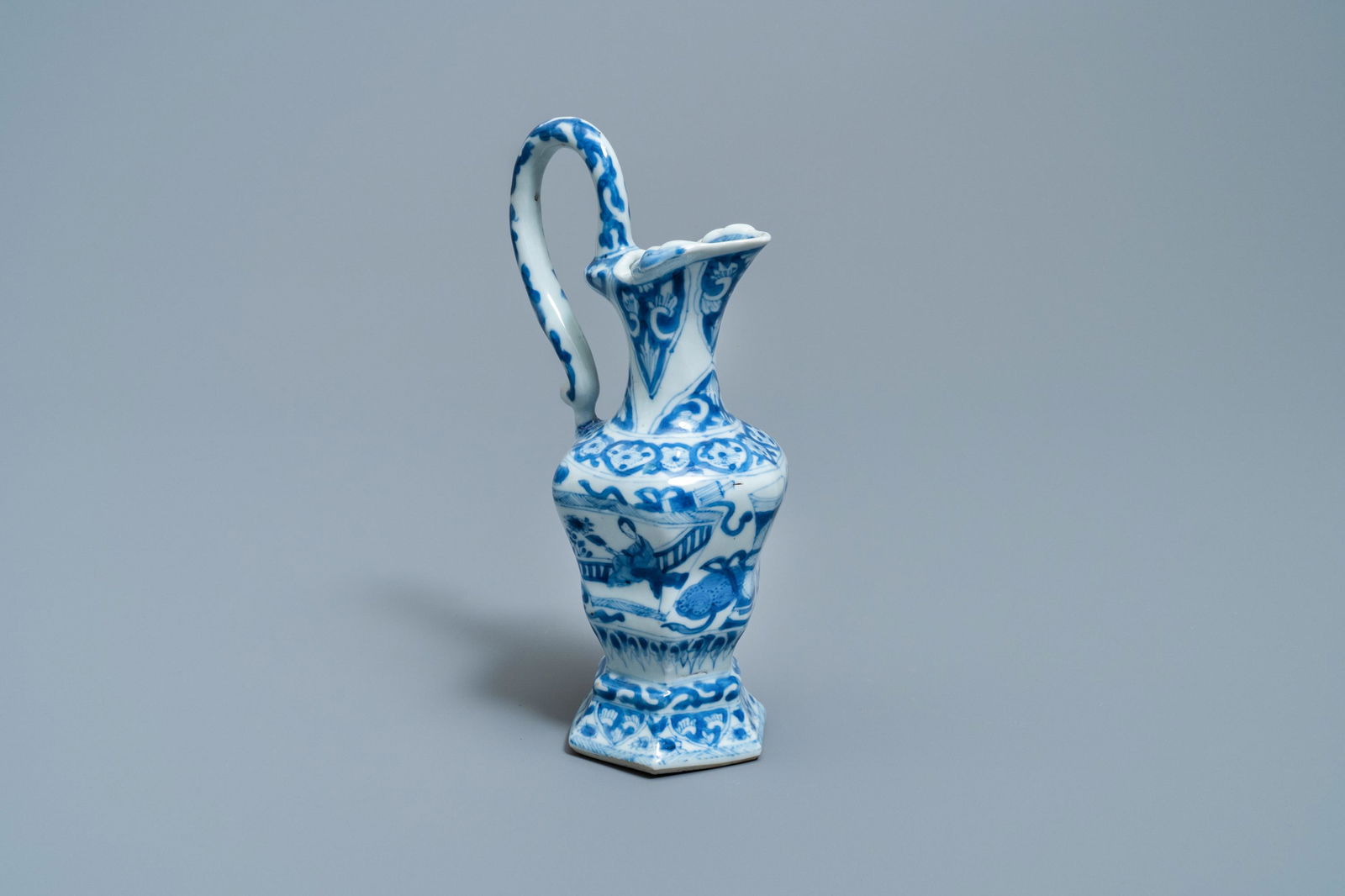A Chinese blue and white ewer after a European silver: A Chinese blue and white ewer after a European silver example, Kangxi H.: 21 cm