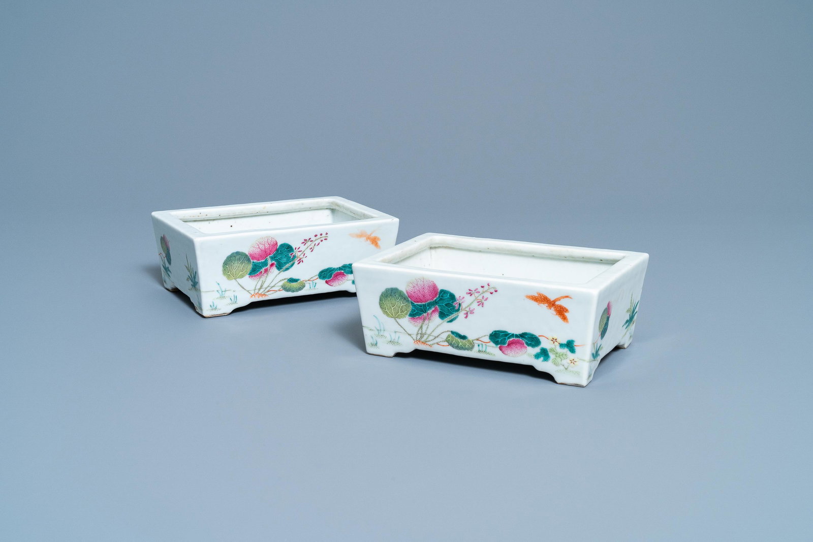 A pair of Chinese rectangular famille rose jardinieres,: A pair of Chinese rectangular famille rose jardinieres, 19th C. Dim.: 18 x 13 x 7 cm Provenance: A Belgian private collection, acquired between ca. 1970 and 2000.