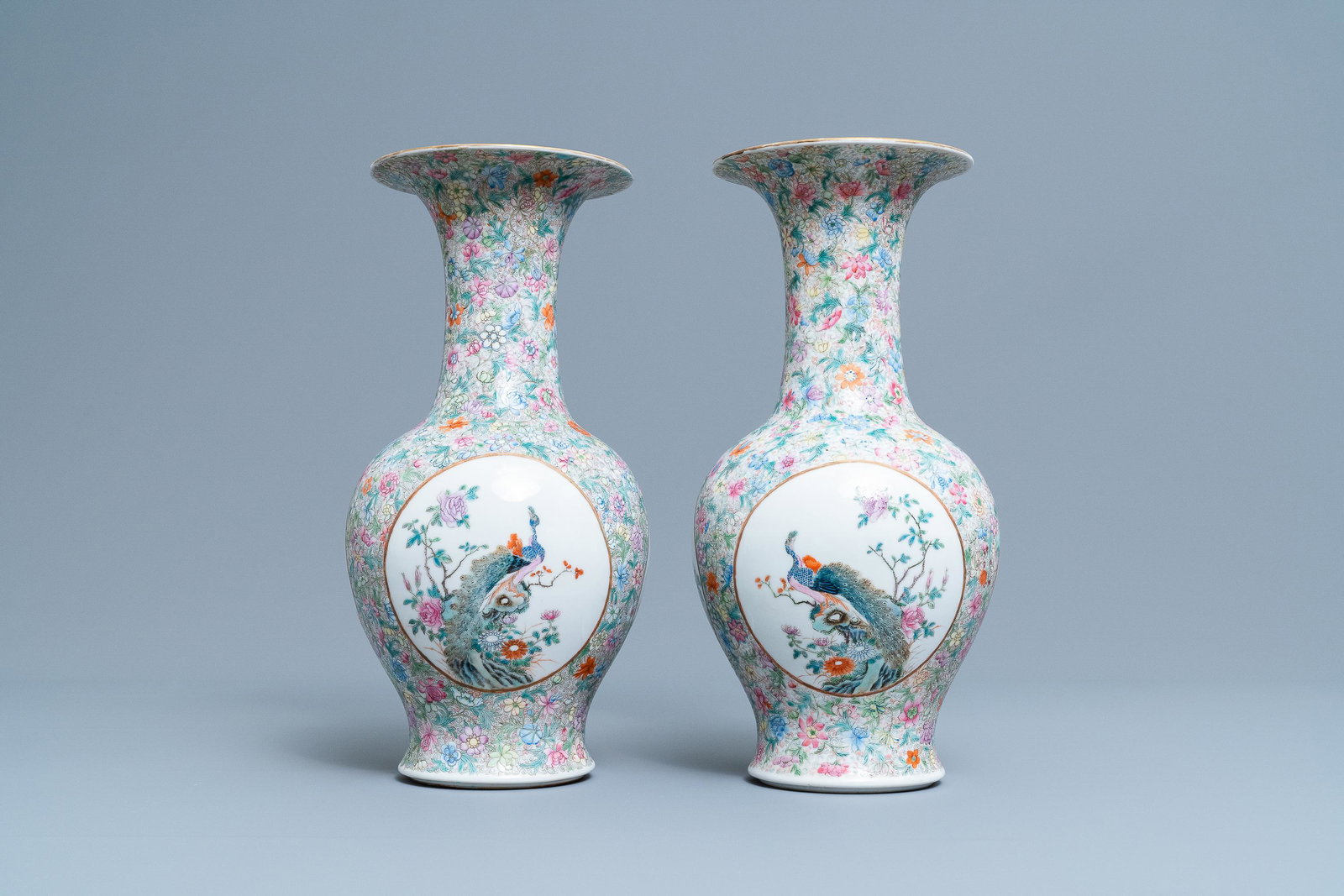 A pair of Chinese famille rose 'millefleurs' vases,: A pair of Chinese famille rose 'millefleurs' vases, Qianlong mark, Republic H.: 36,5 cm