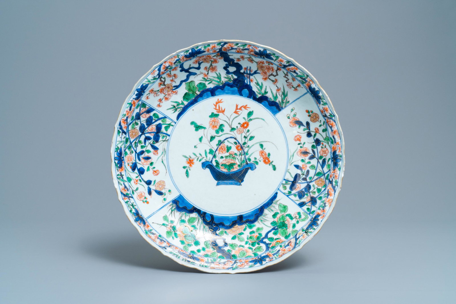 A Chinese famille verte dish with a flower basket,: A Chinese famille verte dish with a flower basket, Kangxi Dia.: 35,5 cm