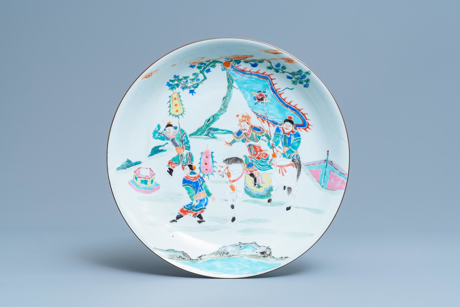 A Chinese famille rose charger with a warlord on: A Chinese famille rose charger with a warlord on horseback with three soldiers, Yongzheng/Qianlong Dia.: 36 cm